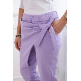 Moteriškos kelnės su asimetrišku priekiu, šviesiai violetinės