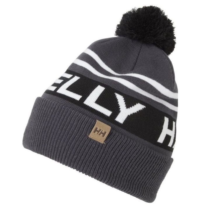 Žieminė kepurė su bumbulu Helly Hansen Ridgeline, 7,5 cm atvartas