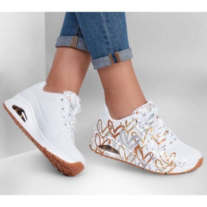 Moteriški sportbačiai su širdžių raštu Skechers Uno, balti