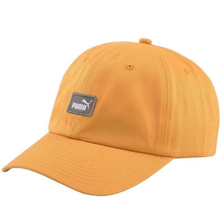 Medvilninė kepurė su lenktu snapeliu Puma Ess Cap III, geltona