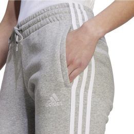 Moteriškos siaurėjančios sportinės kelnės adidas 3 Stripes FL C, pilkos