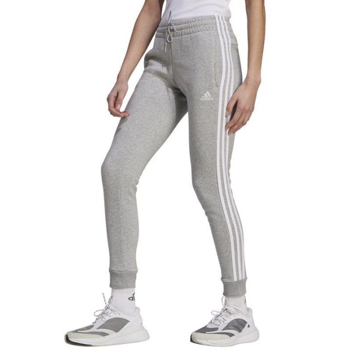 Moteriškos siaurėjančios sportinės kelnės adidas 3 Stripes FL C, pilkos