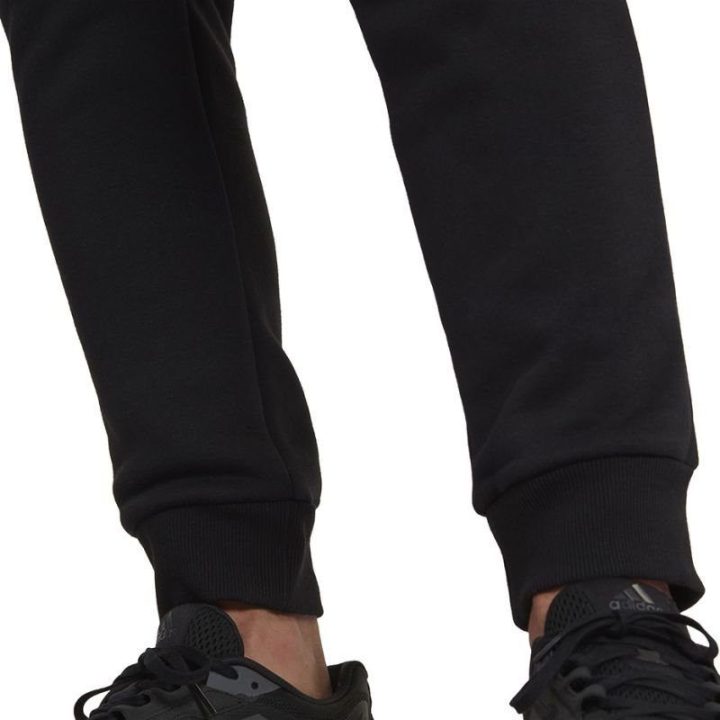 Vyriškos sportinės kelnės su kamufliažo raštu adidas, juodos