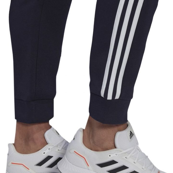 Vyriškos siaurėjančios sportinės kelnės adidas, tamsiai mėlynos