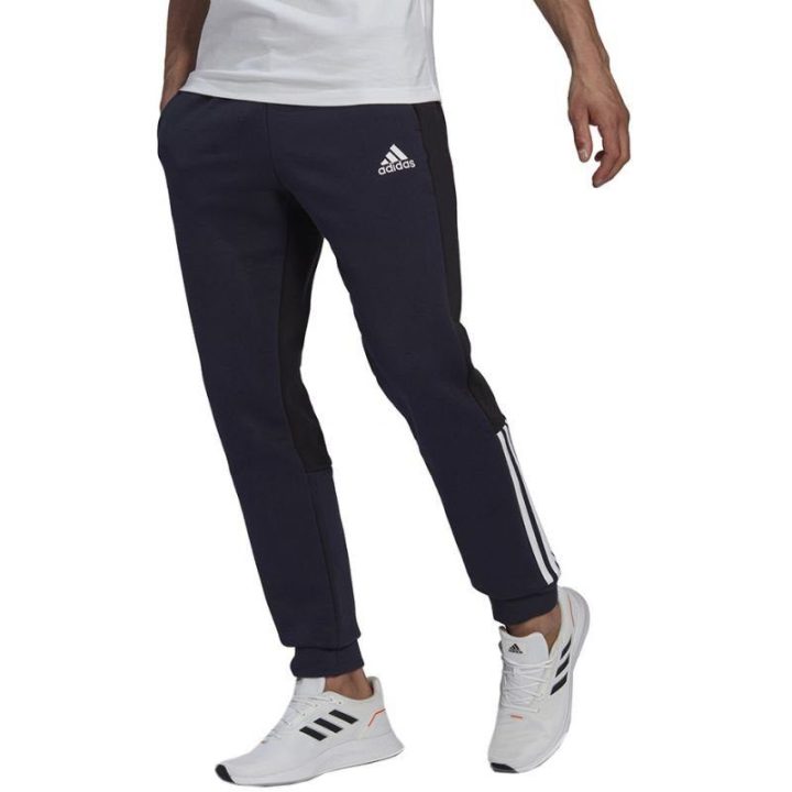Vyriškos siaurėjančios sportinės kelnės adidas, tamsiai mėlynos