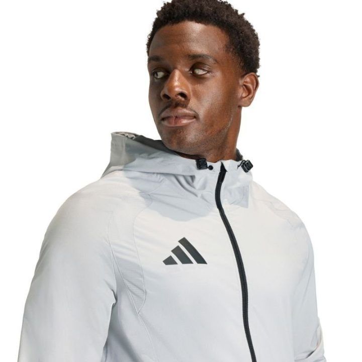 Vyriška vėjo striukė adidas Tiro 26 Travel, šviesiai pilka