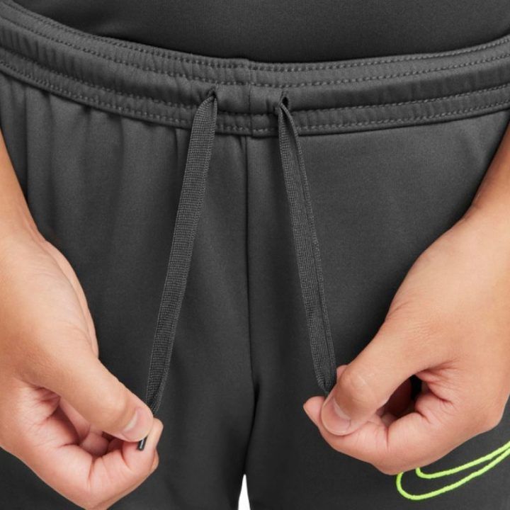 Vaikiškos kelnės su siaurėjančiomis klešnėmis Nike Dri-FIT, pilkos