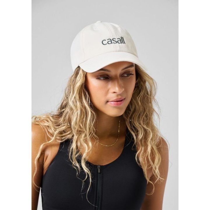 Kepurė su snapeliu Casall Casual Logo Cap, balta