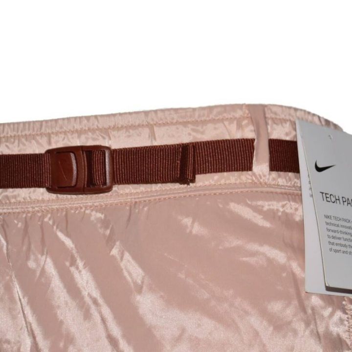Moteriškos laisvo kirpimo kelnės Nike Tech Pack, rožinio aukso