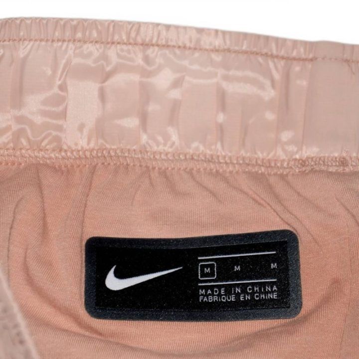 Moteriškos laisvo kirpimo kelnės Nike Tech Pack, rožinio aukso