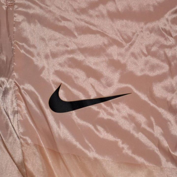 Moteriškos laisvo kirpimo kelnės Nike Tech Pack, rožinio aukso